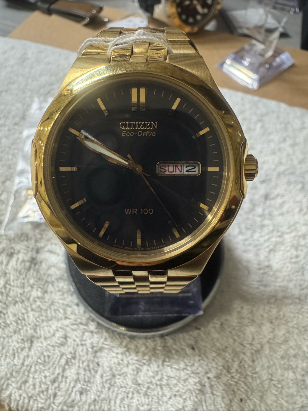 Citizen Gold Tone Watch with Black Dial and Day-Date